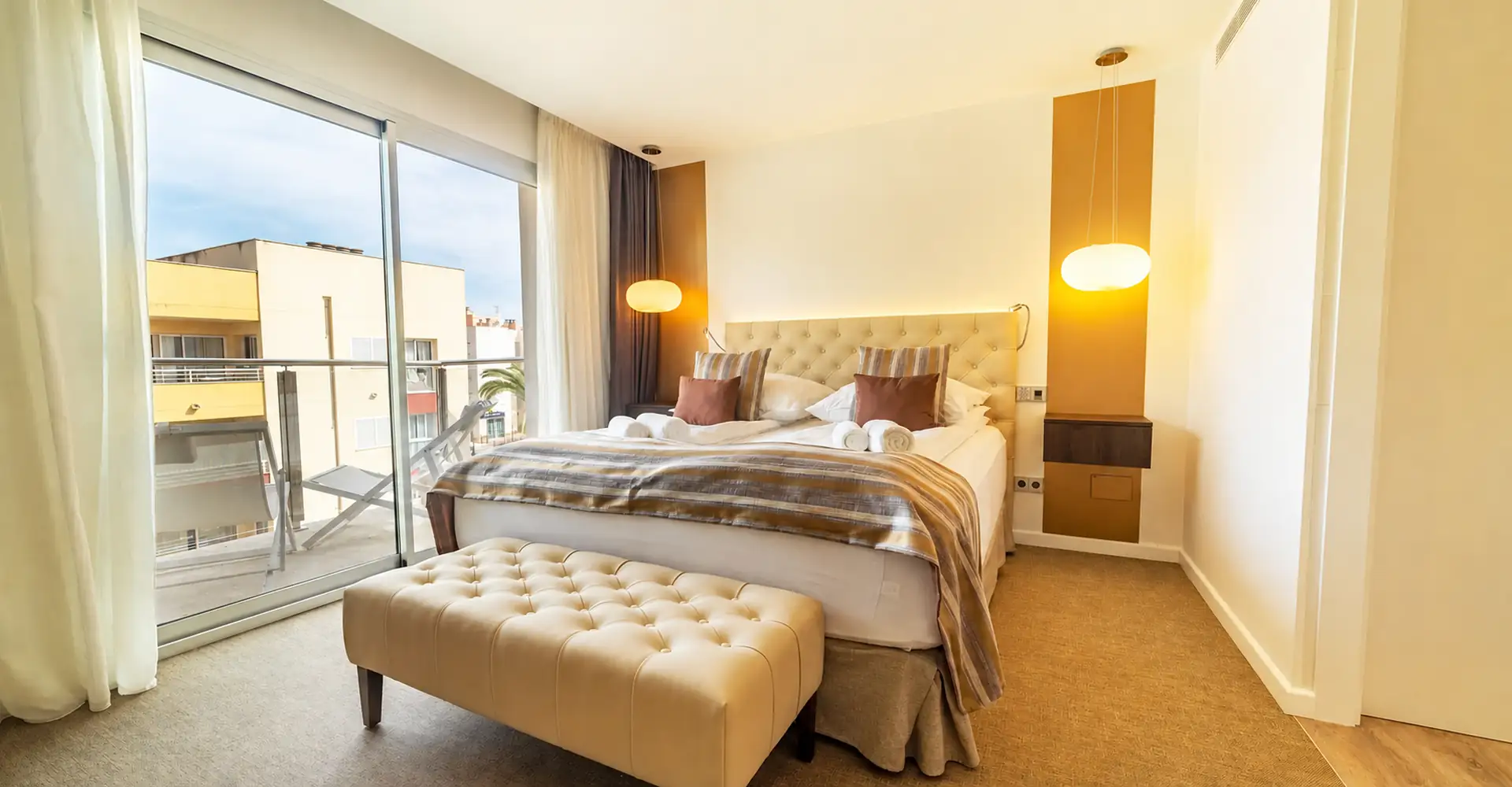 A light-filled suite with balcony at The Sky Hotel